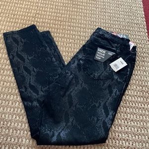 Black snakeskin skinny jeans